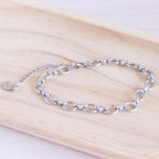 bracelet ovale argenté de près