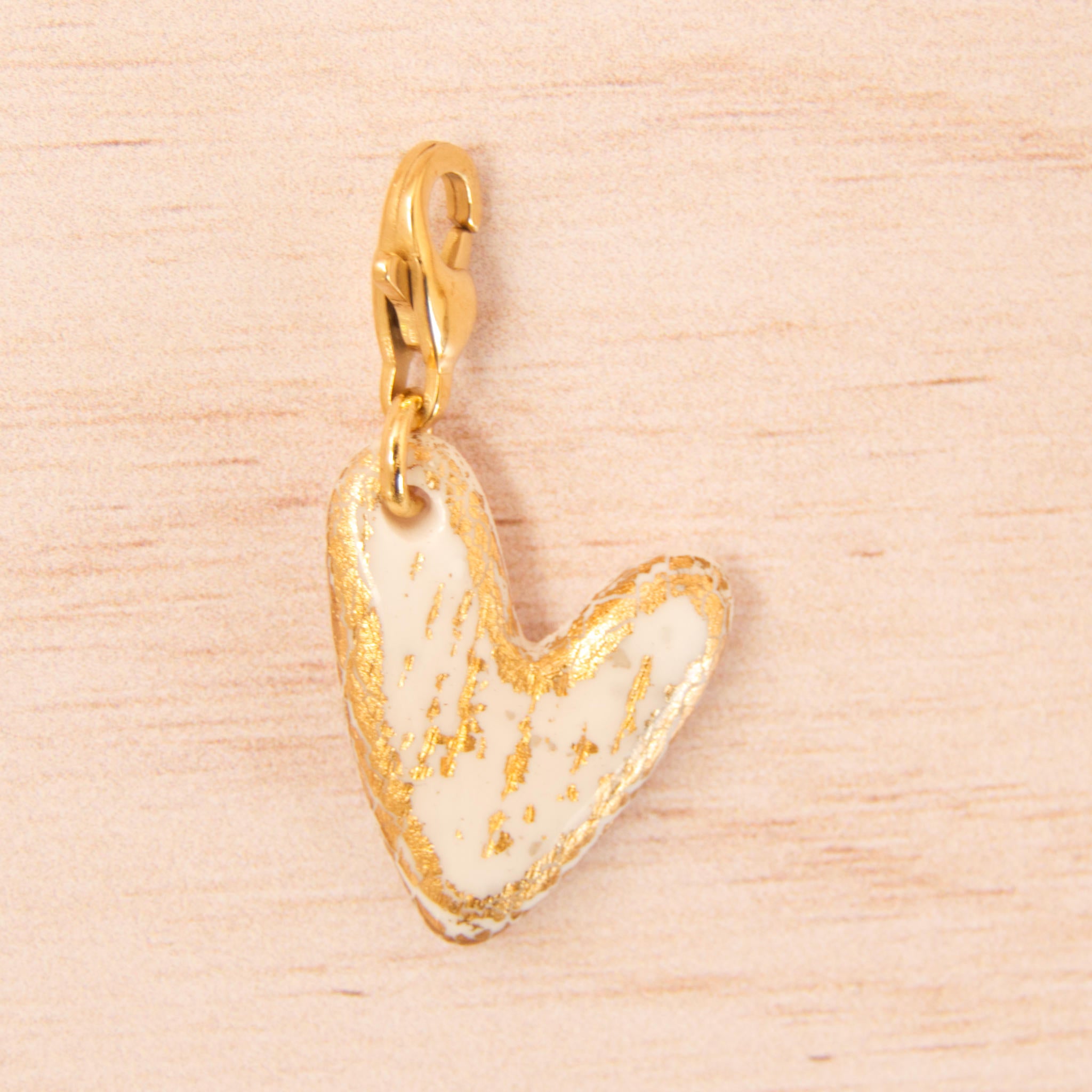 coeur allongé fimo blanc doré