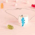 Collier bonbon crocodile en résine