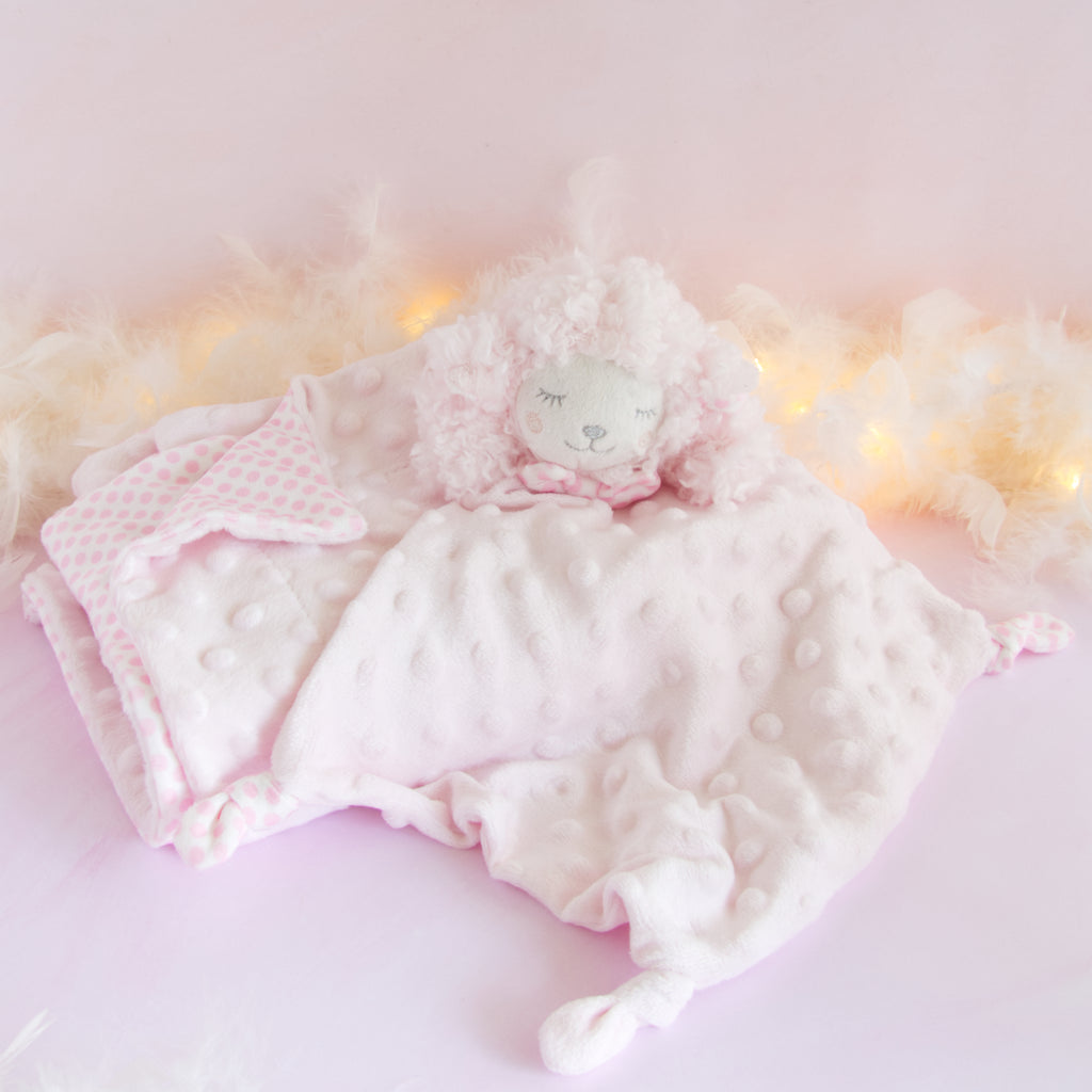 couverture et doudou rose