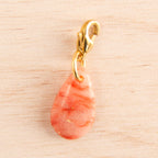 goutte marbré rouge doré