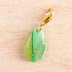 goutte marbré vert doré