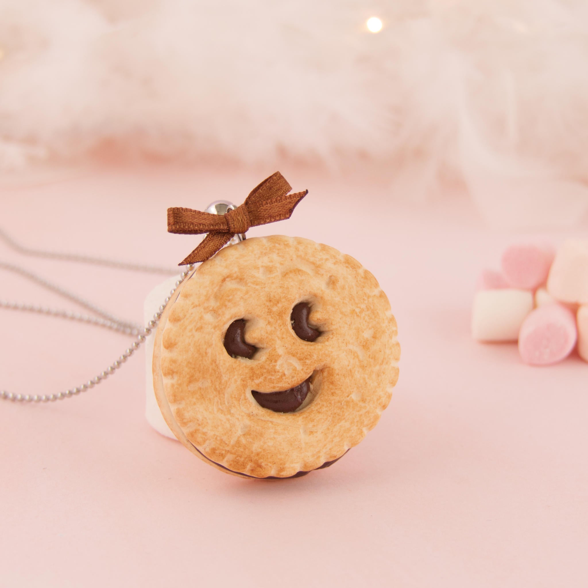 Sautoir gâteau sourire